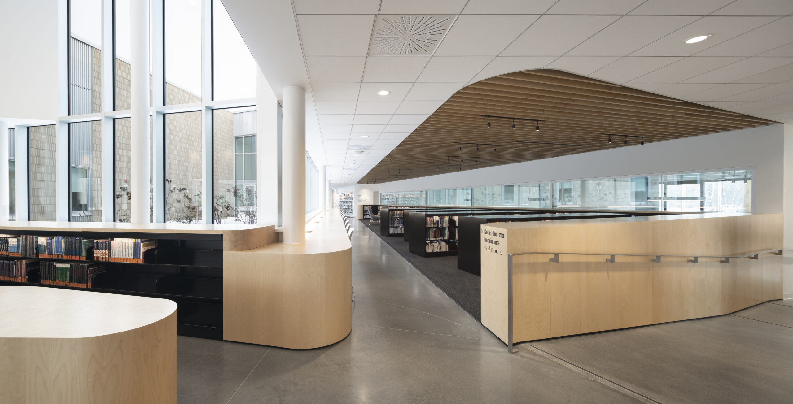Carrefour du Savoir de l'Université de Sherbrooke - Aire de rayonnages- Projet d'architecture